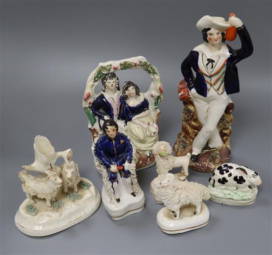 A group of Staffordshire pottery figures and animals